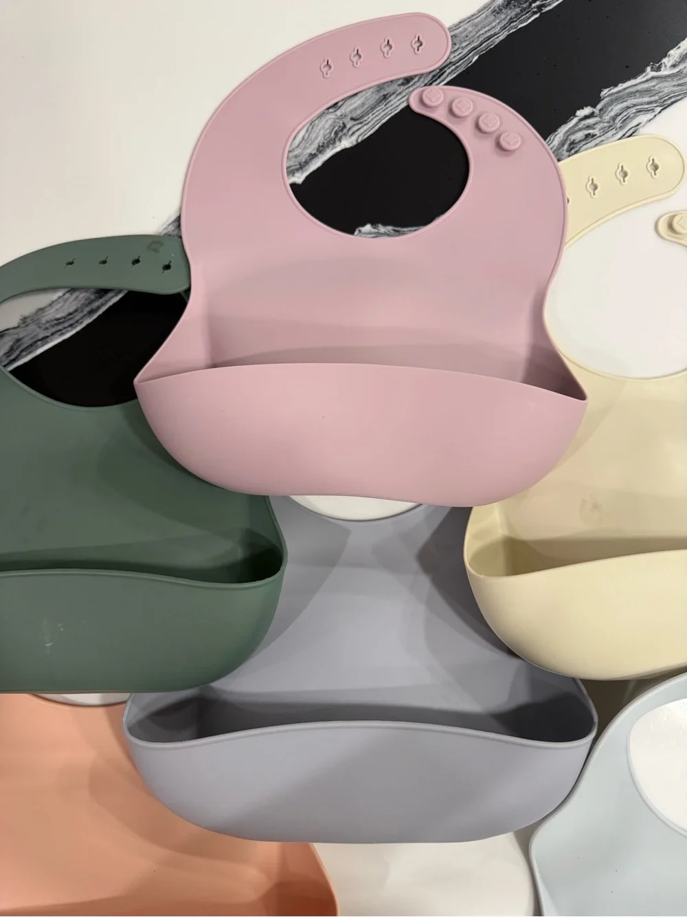 Mushie Adjustable Silicone Baby Bib Set in Pink, Green, Cream, Gray, Peach, Blue